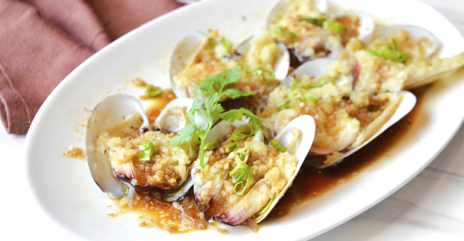 Steamed elephant clams with garlic and vermicelli